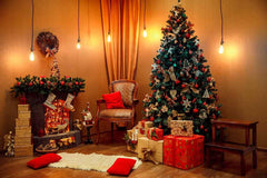 Green Christmas Tree And Chair Under Yellow Light Backdrop For Holiday Photo Shopbackdrop