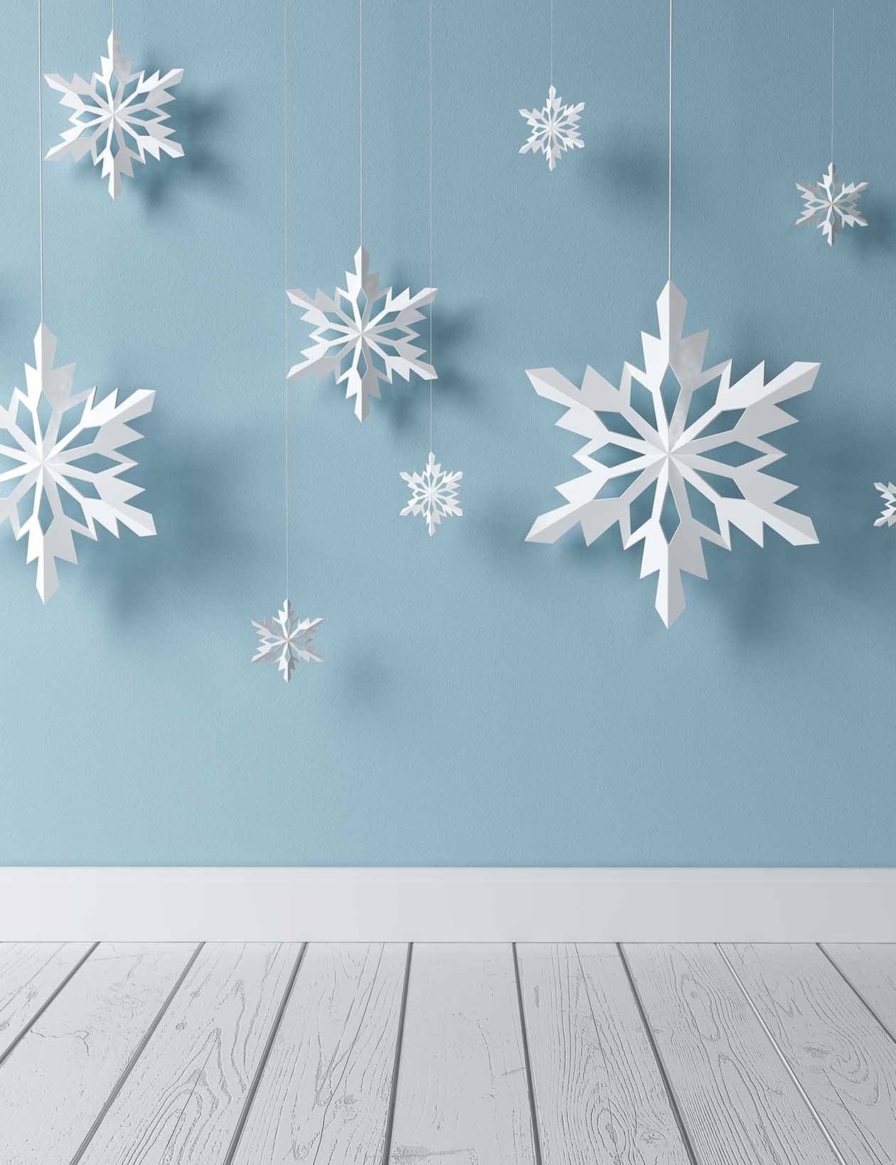 Snowflake Paper Cutting Hanging Before Blue Wall Backdrop Shopbackdrop